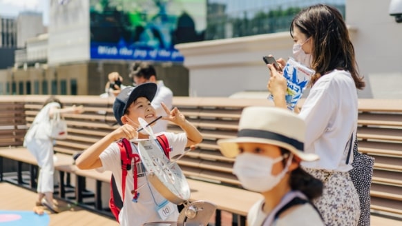 Photo of parent and child having fun